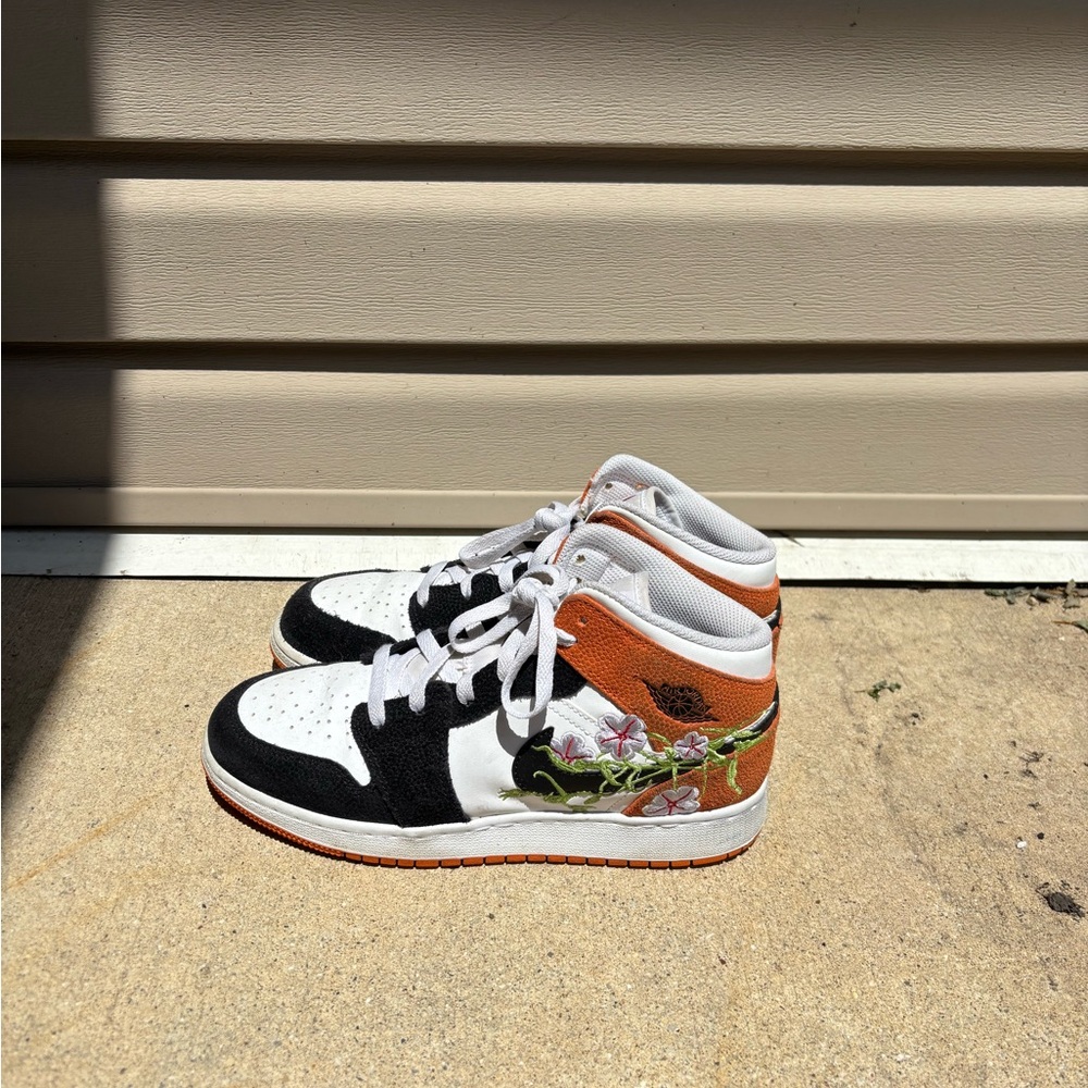 Air Jordan 1 Mid SE Kids Basketball Shoes. These shoes are originally $120